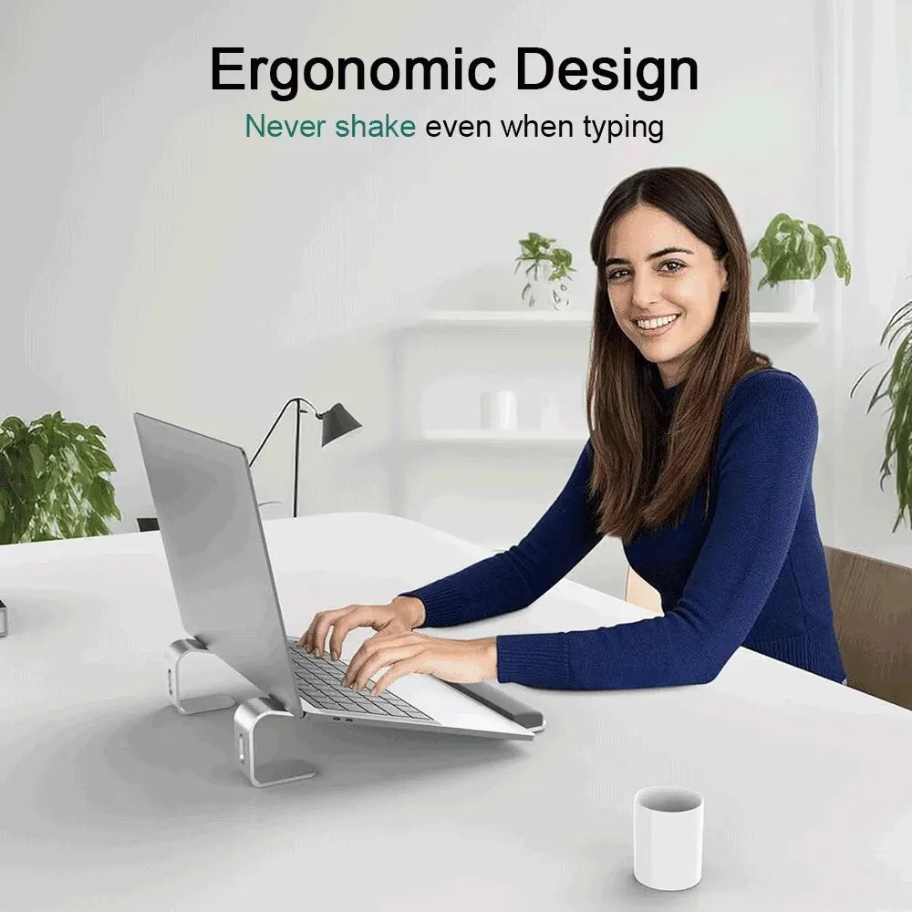 Tech stop aluminum ergonomic laptop stand with wrist pad, portable design, and adjustable base for comfortable typing and viewing.