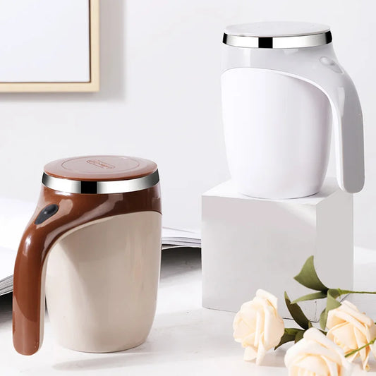 Automatic self-stirring mug by Tech stop with a sleek design, showing the mug with liquid inside and a button to activate stirring.
