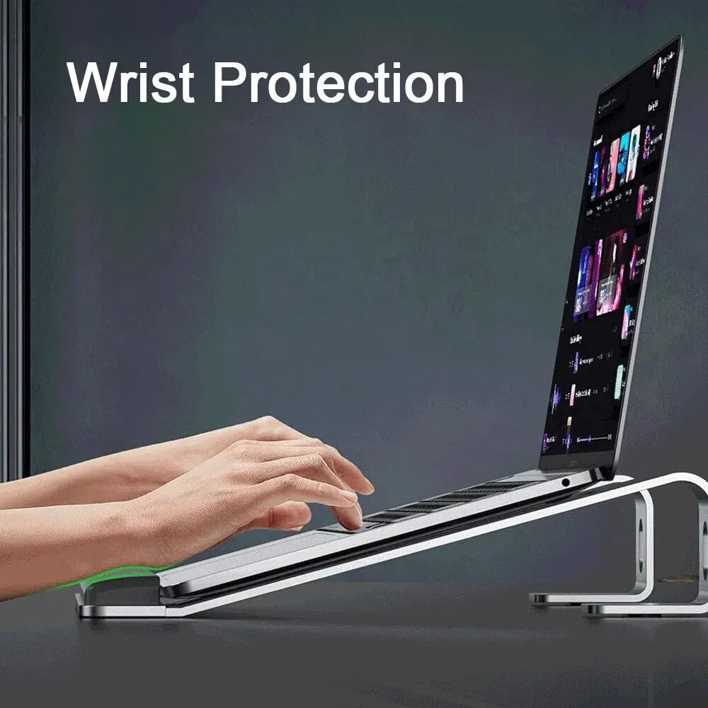 Tech Stop ergonomic aluminum laptop stand with wrist pad, portable design, ideal for comfortable workspace setup.