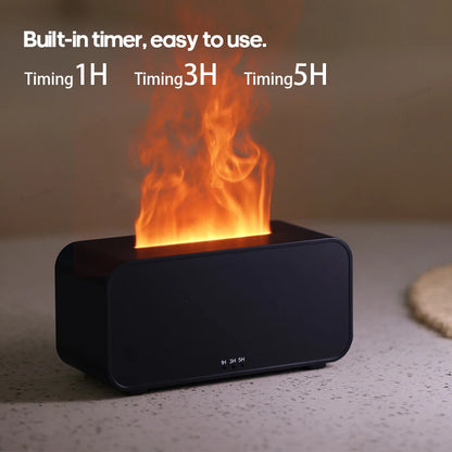 Small Tech Stop Flame Mist Diffuser emitting a gentle mist with a decorative flame design for calming ambiance.