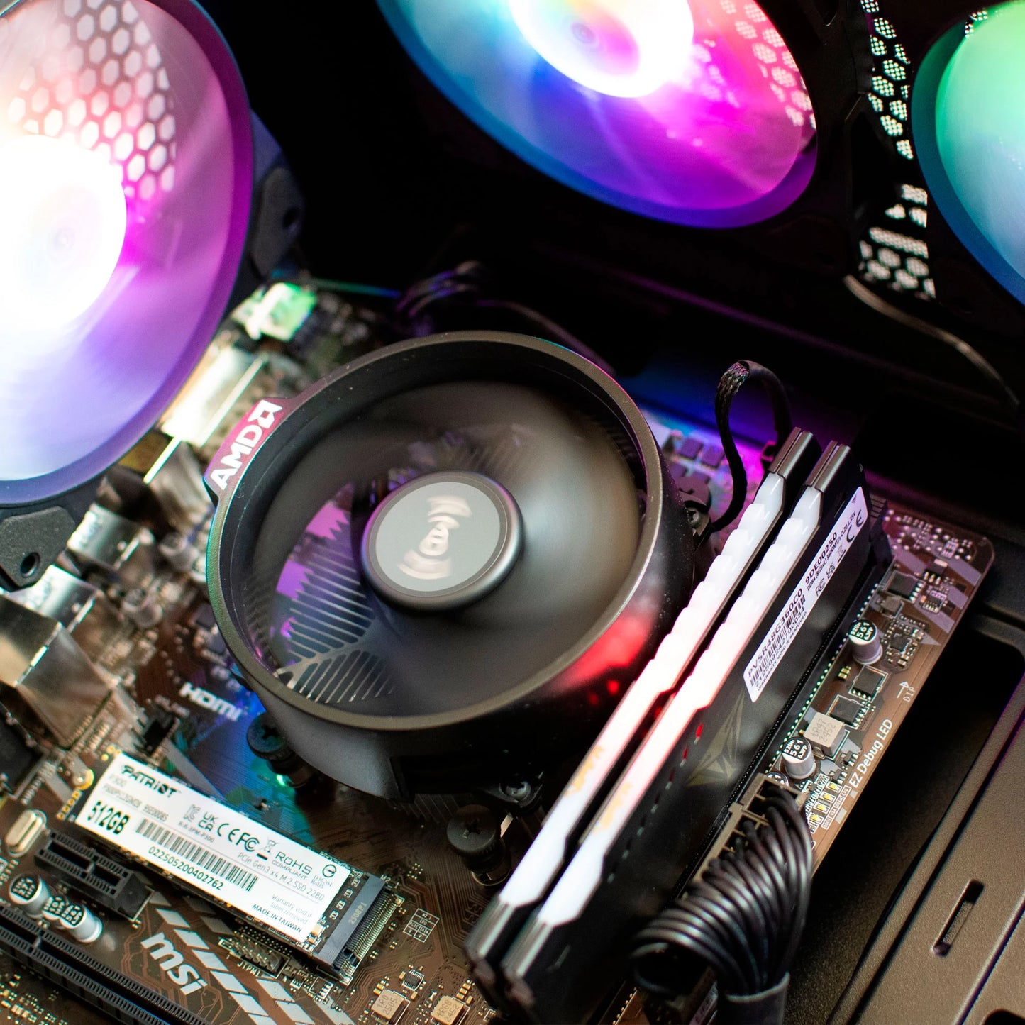 AMD Ryzen 5 5600G PC with 16GB DDR4, 512GB M.2 NVMe SSD, RGB fans, and Windows 11 pre-installed.