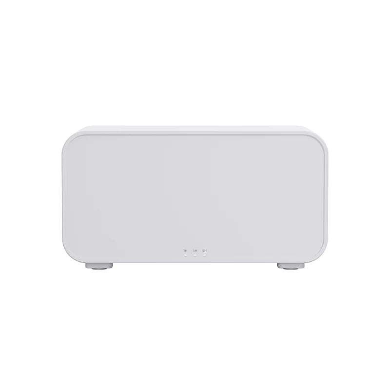 Small Tech Stop Flame Mist Diffuser emitting a soft glow with mist, designed for creating a calming, serene atmosphere at home.