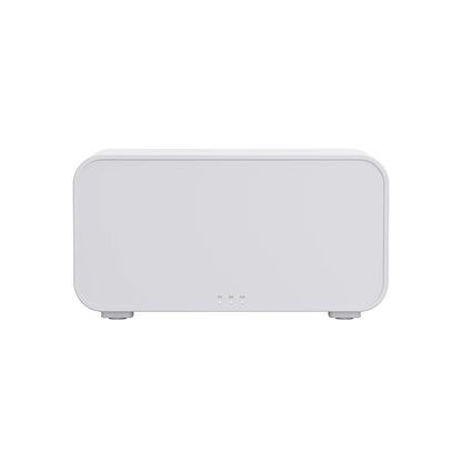 Small Tech Stop Flame Mist Diffuser emitting a soft glow with mist, designed for creating a calming, serene atmosphere at home.