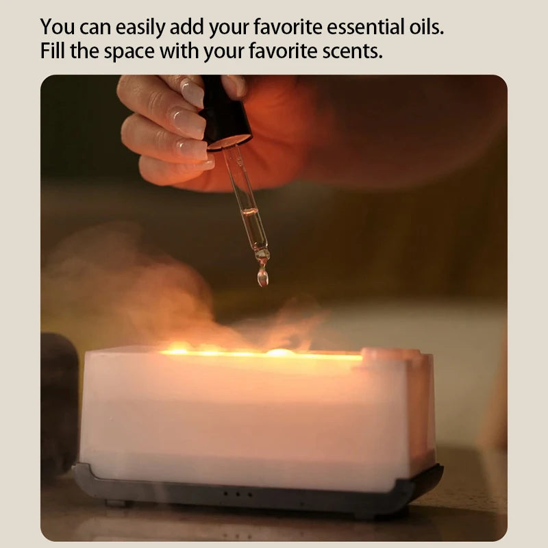Small Flame Mist Diffuser by Tech Stop emitting gentle mist with a warm flame design, creating a calming atmosphere.