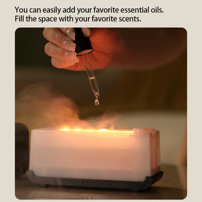 Small Flame Mist Diffuser by Tech Stop emitting gentle mist with a warm flame design, creating a calming atmosphere.