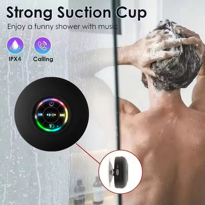 Tech stop AquaBeat Mini waterproof Bluetooth speaker with LED lights and suction cup mount, showcasing its compact design and vibrant LEDs.