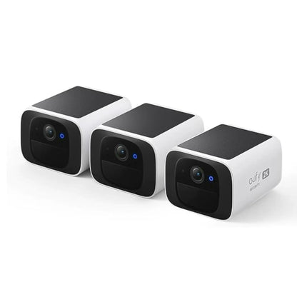 Wireless 2K outdoor solar security camera by Tech Stop mounted on a wall with a clear lens and solar panel for outdoor surveillance.