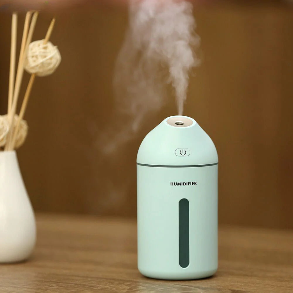 Tech stop AromaDrive 300ml USB diffuser emitting mist with fresh vibes, compact design for portable aromatherapy at home or office.